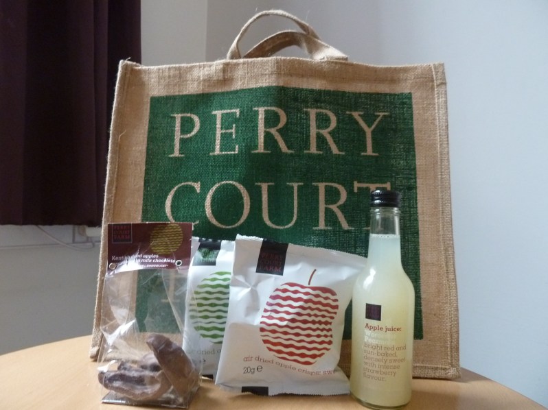 Apple crisps, apple juice and chocolate-covered apple segments