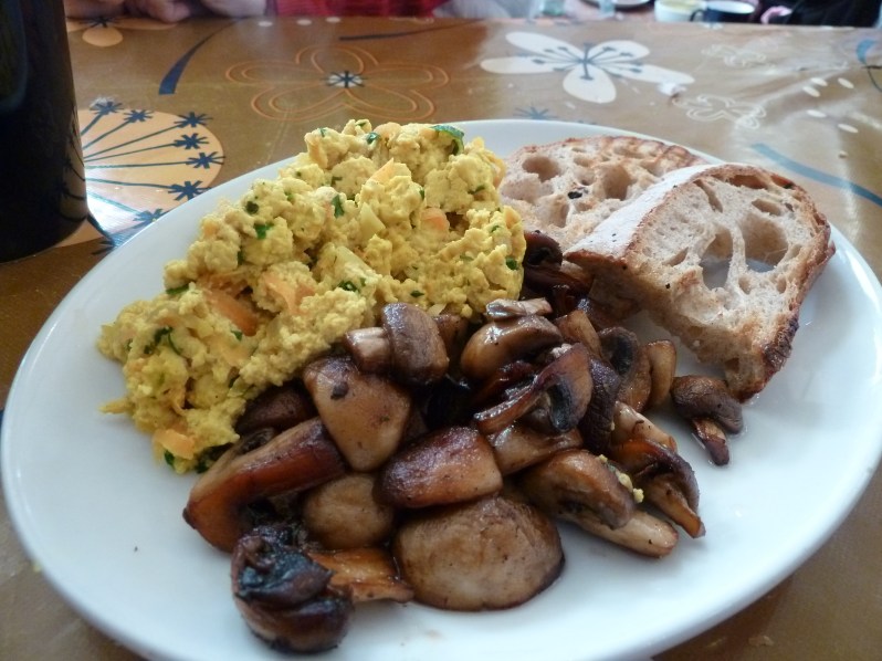Scramble tofu and garlic mushrooms with sourdough toast