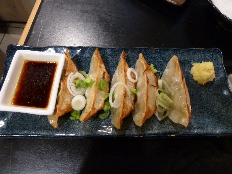Pork gyoza with soy, ginger and spring onions