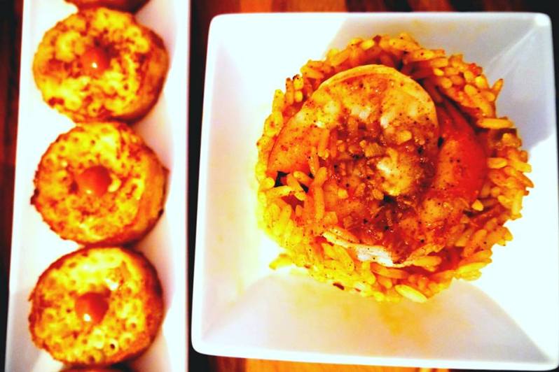 Jambalaya with some mac n cheese sushi style to the left