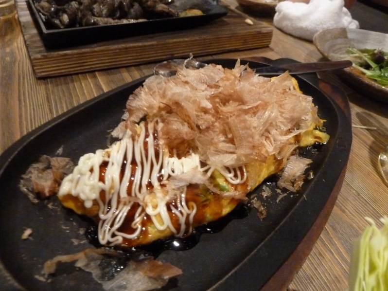 Omeletter with sweet brown sauce and covered in mayo and fish flakes. It's better than it sounds - although this one was a tad overly sweet for me.