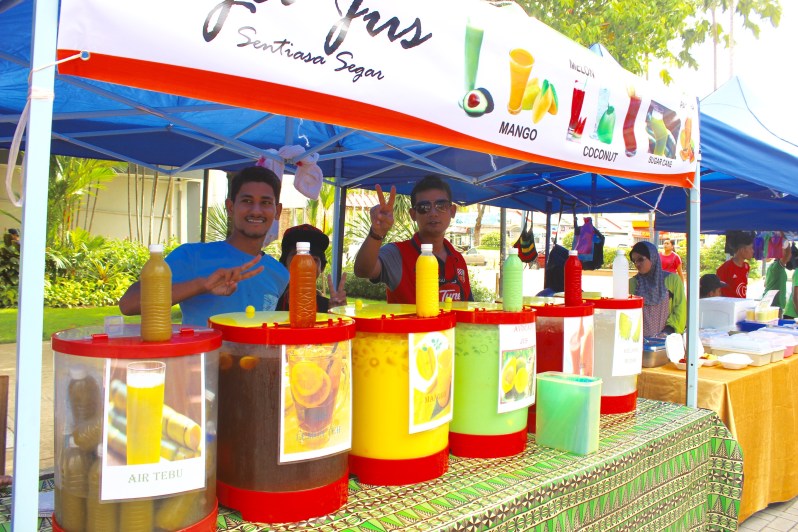 Say cheese! Friendly guys at the market